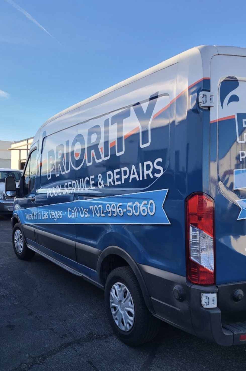 Priority Pool Service branded van at the shop